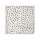 A square 12x12 cardstock featuring a repeating pattern of small blueberries with green leaves on a warm off-white background.