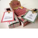 Three decorative Christmas gift boxes with patterned wrapping paper and hanging tags, arranged on a light beige background. The tags read 'warme Kerstgroet', 'EINE KERST', and 'JAHRE KERST', with one tag tied with gold string.