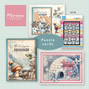 A collage of Marianne Design puzzle cards featuring whimsical illustrated scenes, including mushrooms, a winter house, and puzzle pieces, with a pink Marianne Design logo and a teal 'Puzzle cards' label.
