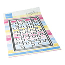 A metal jigsaw puzzle cutter sheet from Marien Design, shown on its printed backing card. The card features a colorful striped border in pastel pink, yellow, blue, and white, with the Marien Design logo in the top-left corner and the word 'Craftables' written in script at the top.