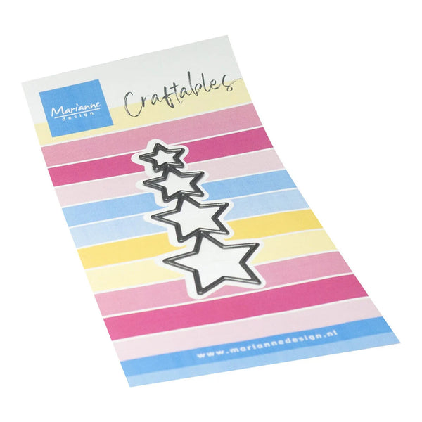 A set of four star-shaped craft dies with black metal outlines and white centers, presented on a colorful striped card from Marianne Design.