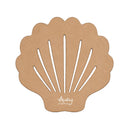 A scalloped shell-shaped wooden board in a natural light brown wood tone, featuring cutouts and the brand name 'Munty Puddle' printed near the bottom, set against a plain white background.