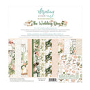 A 12 x 12 inch scrapbooking paper set titled 'The Wedding Day' by Montay Papers, featuring 12 patterned sheets with floral, lace, and pastel designs, shown on a white backing card.