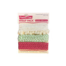 Holiday Style Wrap Pack containing three assorted length custom trims: a cream pom-pom trim, a green and white striped baker's twine, and a dusty pink crochet lace trim, shown in its retail packaging.