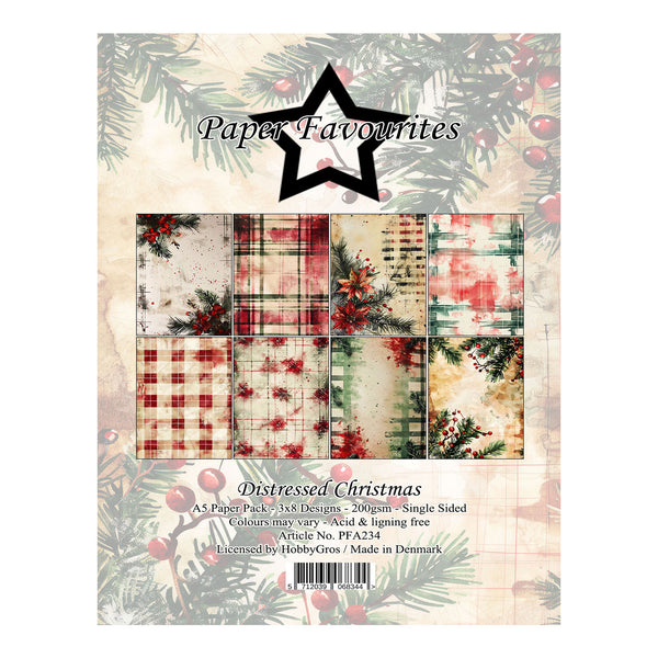Paper Favourites 'Distressed Christmas' paper pack cover, featuring a 6x2 grid of festive patterned papers including plaid, stripes, and holiday foliage on a vintage beige background with pine branches and red berries.