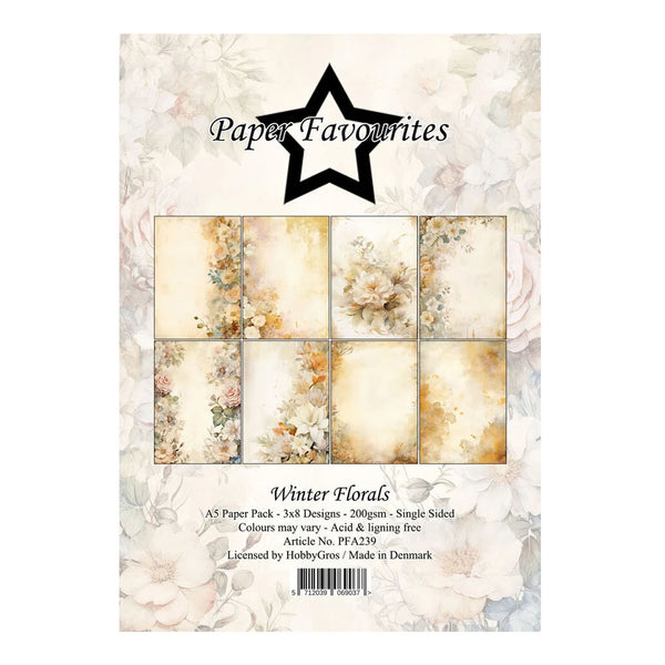 Paper Favourites Winter Florals paper pack packaging, featuring a floral design with a central window showing eight sample card designs in soft cream, beige, and muted pink tones.