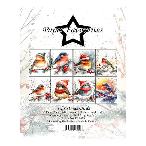 Paper Favourites Christmas Birds paper cut file set, featuring six different bird illustrations wearing red Santa hats and scarves on snowy branches, with product details printed below.