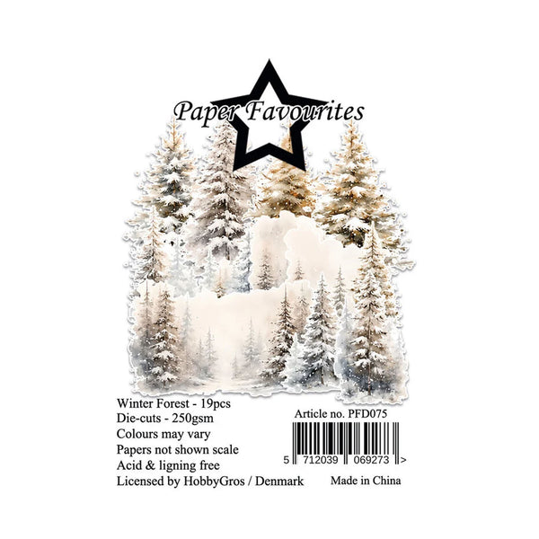 Product packaging card for 'Paper Favourites' die-cuts featuring a winter forest illustration with snow-covered pine trees and a black star logo at the top, plus product details and a barcode below.