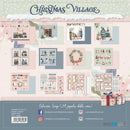 Christmas Village scrapbook paper collection packaging showing 24 double-sided sheets with various festive designs including village scenes, wreaths, stripes, and gift boxes on a pastel background.