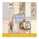 A square scrapbook paper collection pack labeled 'Camino de Santiago Buen Camino' with multiple coordinated paper designs in a rustic Spanish Camino theme, including maps, flowers, boots, a lighthouse, a cow, and scenic collage elements, plus a yellow band at the bottom reading 'Coleccion Scrapbook 30 Papeles doble cara'.