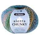A ball of Patons Sierra Chunky yarn with a light blue label, featuring variegated colors of teal, green, pink, and yellow.