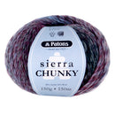 A ball of Patons Sierra Chunky yarn with a light blue paper label, showing a variegated texture of purple, pink, and gray yarn strands.