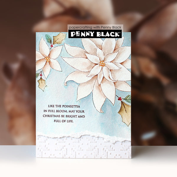 A handmade greeting card featuring watercolor poinsettia flowers, holly leaves, and a printed quote, displayed against a blurred brown background. The card has a black bar with the brand name 'PENNY BLACK' and a small text overlay reading 'cardcrafting with Penny Black'.