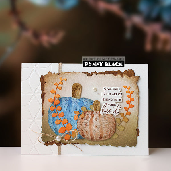 A handmade autumn-themed greeting card by Penny Black, featuring two textured pumpkins in blue and beige, orange leafy vines, and the sentiment 'Gratitude is the art of seeing with your heart'.
