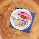Card with illustration of a child holding an umbrella, featuring the brand 'Penny Black'.