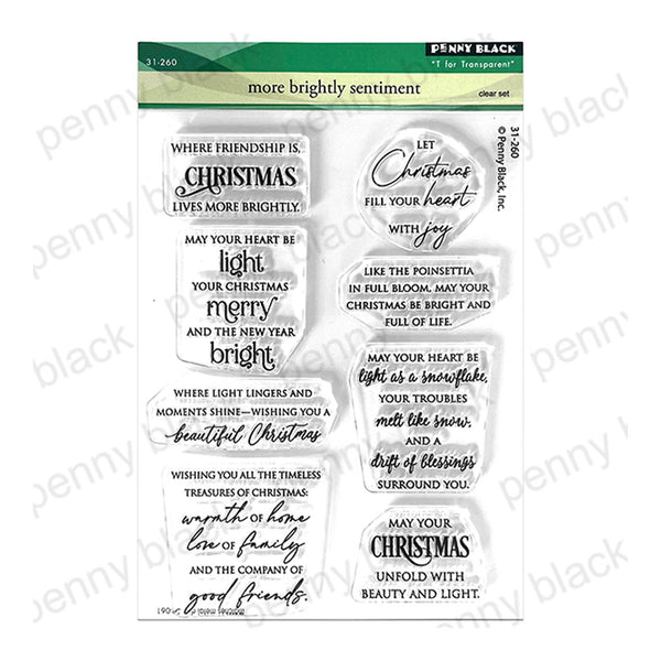 Penny Black 'more brightly sentiment' clear set with multiple transparent stamp pieces featuring Christmas-themed phrases on a white background.