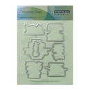 Penny Black Creative Dies set on a light green backing card, featuring six different steel cutting die shapes.