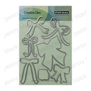 Penny Black Creative Dies 100% Steel Cutting Dies set featuring a festive wreath and ribbon design, shown on its original green packaging card.