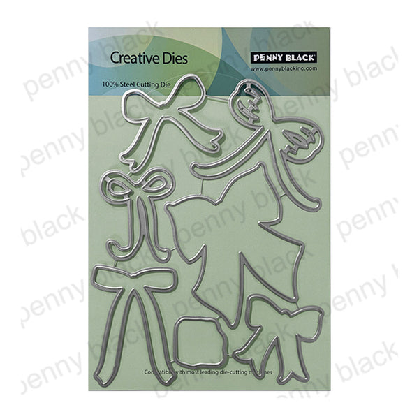 Penny Black Creative Dies 100% Steel Cutting Dies set featuring a festive wreath and ribbon design, shown on its original green packaging card.