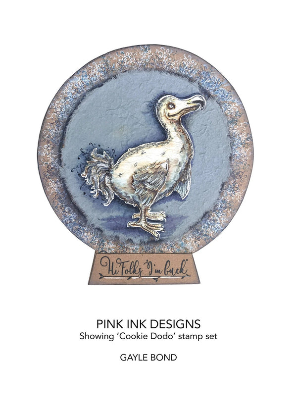 Decorative stamp with a duck design and 'Pink Ink Designs' branding on a white background