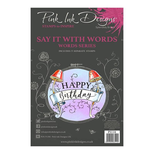Pink Ink Designs stamp set packaging with mushrooms and 'Happy Birthday' text on a dark background