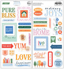 Two sheets of decorative paper with text and graphics, featuring phrases like 'Pure Bliss' and 'Ordinary Joys'.