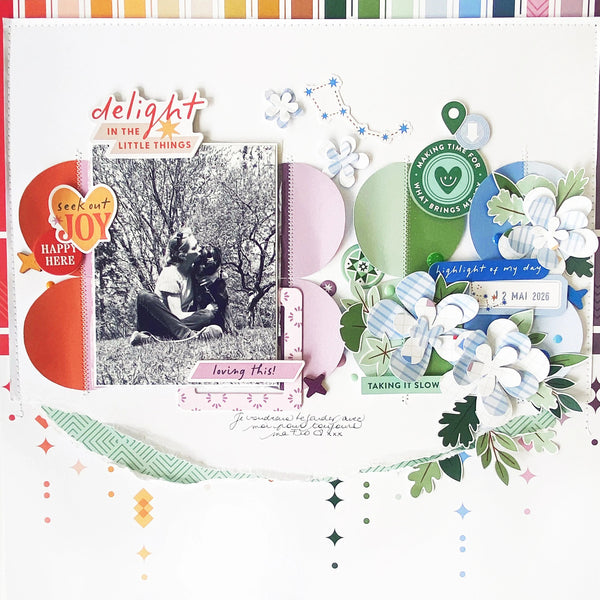 Scrapbook layout with photos, text, and decorative elements on a white background