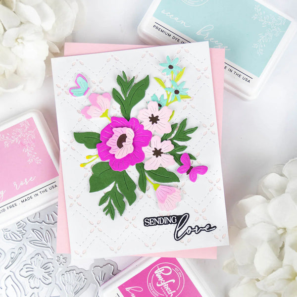 Floral card with 'Sending Love' text on a white background with floral decorations.