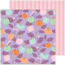 A square sheet of patterned paper with a lavender background and a repeating design of pumpkins in orange, mint green, and pale pink, with purple leaves and stems. A second pink striped paper sheet is partially visible behind it on the right side.