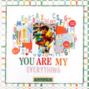 A square scrapbook-style card or print with a white center, colorful decorative letters, circles, stars, and a central photo of a smiling boy holding stuffed animals. Large text reads 'YOU ARE MY EVERYTHING,' with smaller text including 'Thank you for this' and 'loving you!'.