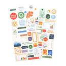 Two sheets of 'Ordinary Joys' planner stickers featuring colorful text labels, icons, and decorative elements on a clean white background.