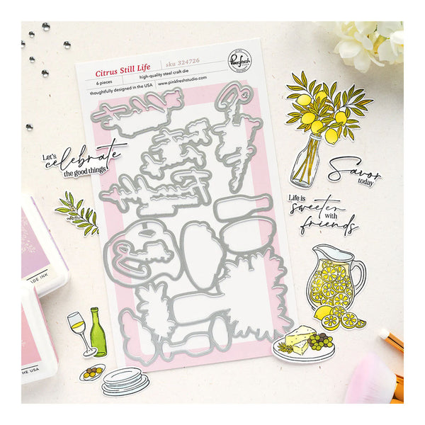 Metal die cutters with citrus-themed designs on a light background