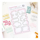 A flat-lay product photo of a stamp and die set called 'Treasured Greetings' by Pinhead Studios. The set includes a sheet of pink and white embossed rubber stamps and a matching sheet of metal cutting dies.