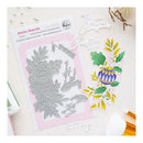 Festive Flourish double-edge steel embosser plate set by Pride & Co, shown with its pink and white packaging insert and a sample of the stamped design on a light beige flat-lay background.