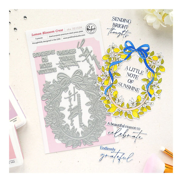 Decorative metal cutting dies with floral design and text on a white background