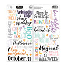 A sheet of scrapbook paper featuring colorful Halloween-themed typography with words like 'Boo', 'Trick or Treat', 'Spooky', 'Ghoulish', and 'Magical' in playful mixed fonts and colors.