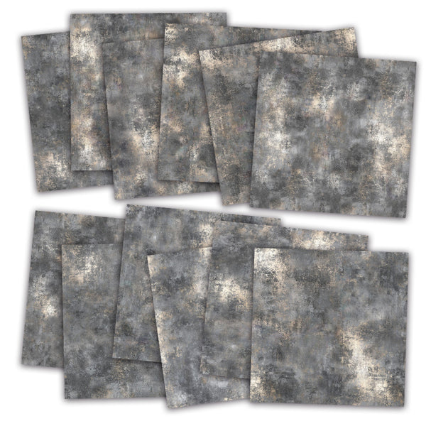 Twelve square sheets of textured gray and beige patterned paper, arranged in two overlapping stacks on a white background.