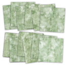 A set of square sheets with a mottled sage green and white textured pattern, arranged in two overlapping groups on a plain white background.