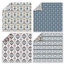 Four square sheets of patterned paper arranged in a 2x2 grid on a white background. Each sheet shows a different repeating design: a cream and blue tree pattern, a blue snowflake pattern, a white and gray diamond pattern with small red accents, and a white and blue animal print with a folded corner showing a cream patterned backing.