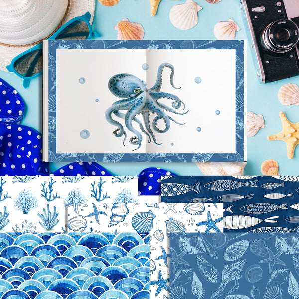An open notebook or card set displayed on a light blue surface with nautical props. The central item shows a blue octopus illustration with a blue patterned border.