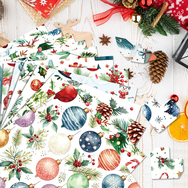 A styled flat-lay of multiple sheets of Christmas wrapping paper with watercolor holiday illustrations, surrounded by festive props like pinecones, evergreen branches, candy canes, and wrapped gifts on a white wood background.