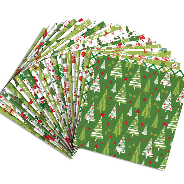 A fan of Christmas-themed wrapping paper sheets on a plain white background. The papers feature various holiday patterns including pine trees, candy canes, ornaments, and snowflakes in green, white, and red.