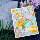 Card with floral and butterfly design on a dark background