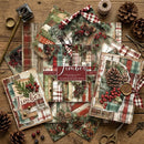 Scrapbooking paper sheets with Christmas-themed designs on a wooden surface.