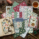 Collection of winter-themed scrapbooking paper sheets on a wooden surface with decorative items.