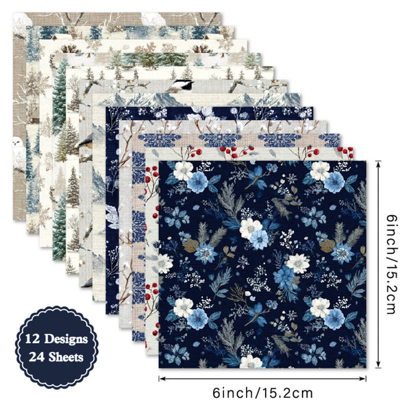 A set of 12 patterned paper sheets arranged in a fan stack, showing various winter and floral designs. The front sheet features a dark navy blue background with blue, white, and light blue floral motifs.