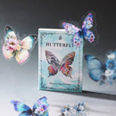 A boxed butterfly-themed product labeled 'BUTTERFLY' and 'Shadow Star Dream' stands upright on a reflective surface, surrounded by translucent butterfly decorations in pastel blue, pink, purple, and teal.