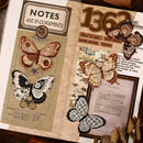 Decorative paper with butterfly designs and text on a wooden surface