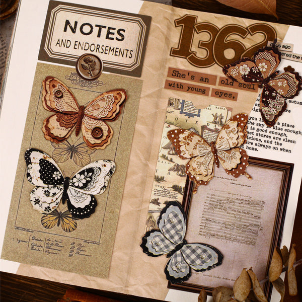 Decorative paper with butterfly designs and text on a wooden surface
