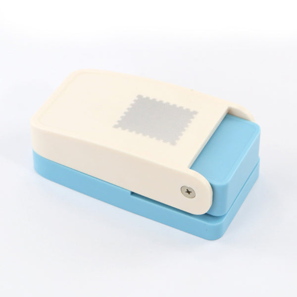 Blue and beige rectangular object with a textured surface on a white background